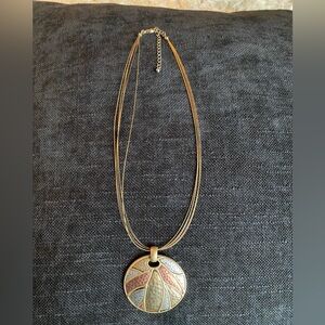 Elegant Gold and Silver Pendant Necklace